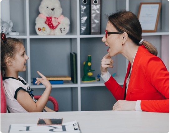 A Speech-Language therapist doing Speech therapy