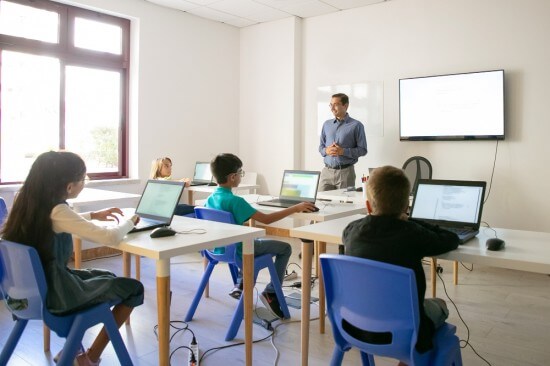 A group of students sitting in a class