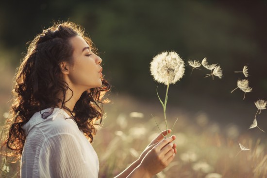 A happy girl, indicating inner wellness