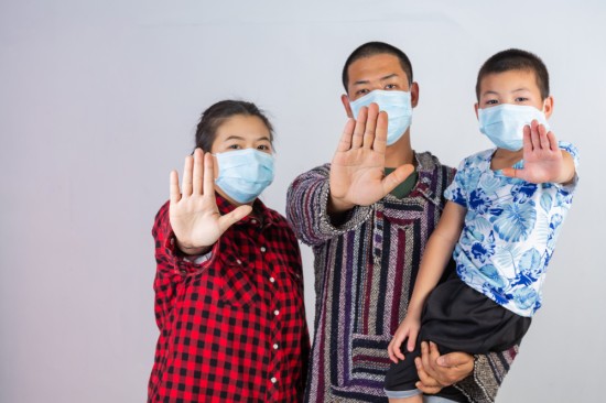 A family showing their clean hands