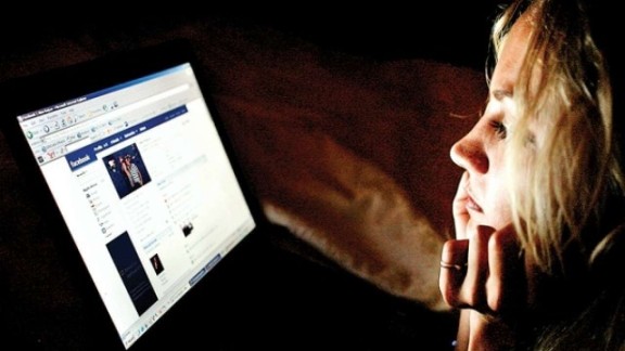 A girl checking her Facebook account