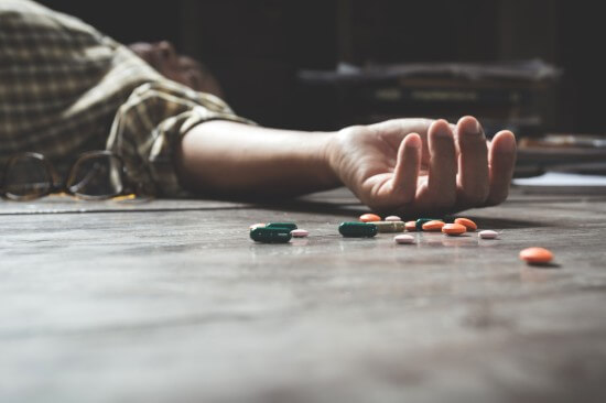 A man depicting suicide