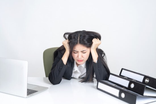 A stressed-out female employee
