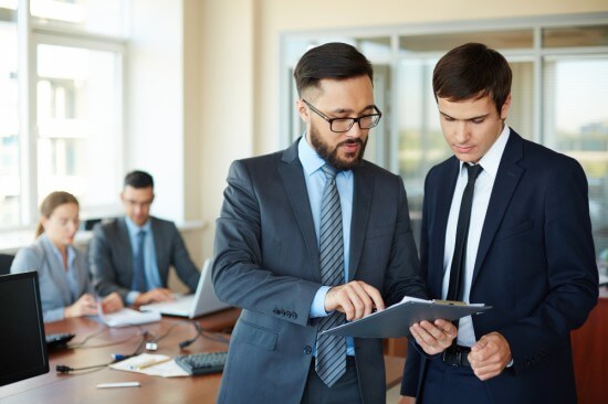 Employees discussing a project