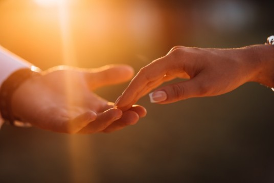 Hands of couple indicating communication