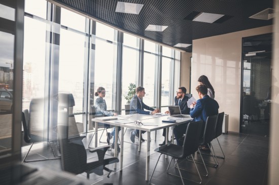 Manager having a meeting with his team