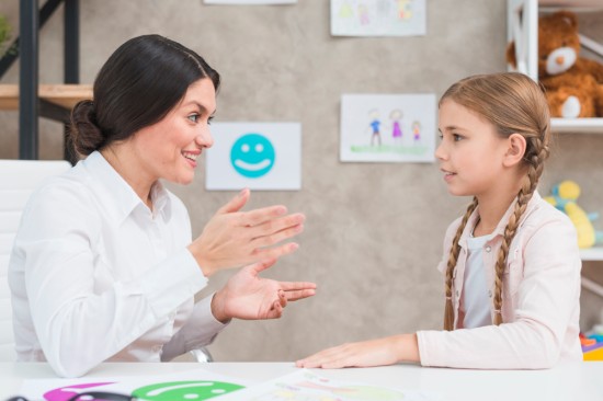 Speech therapist doing speech therapy