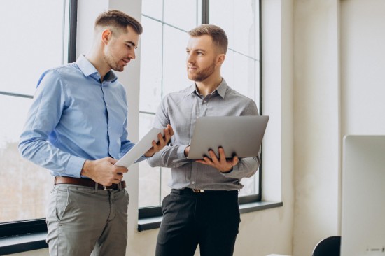 Two employees discussing something