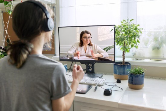 Woman taking Online counselling