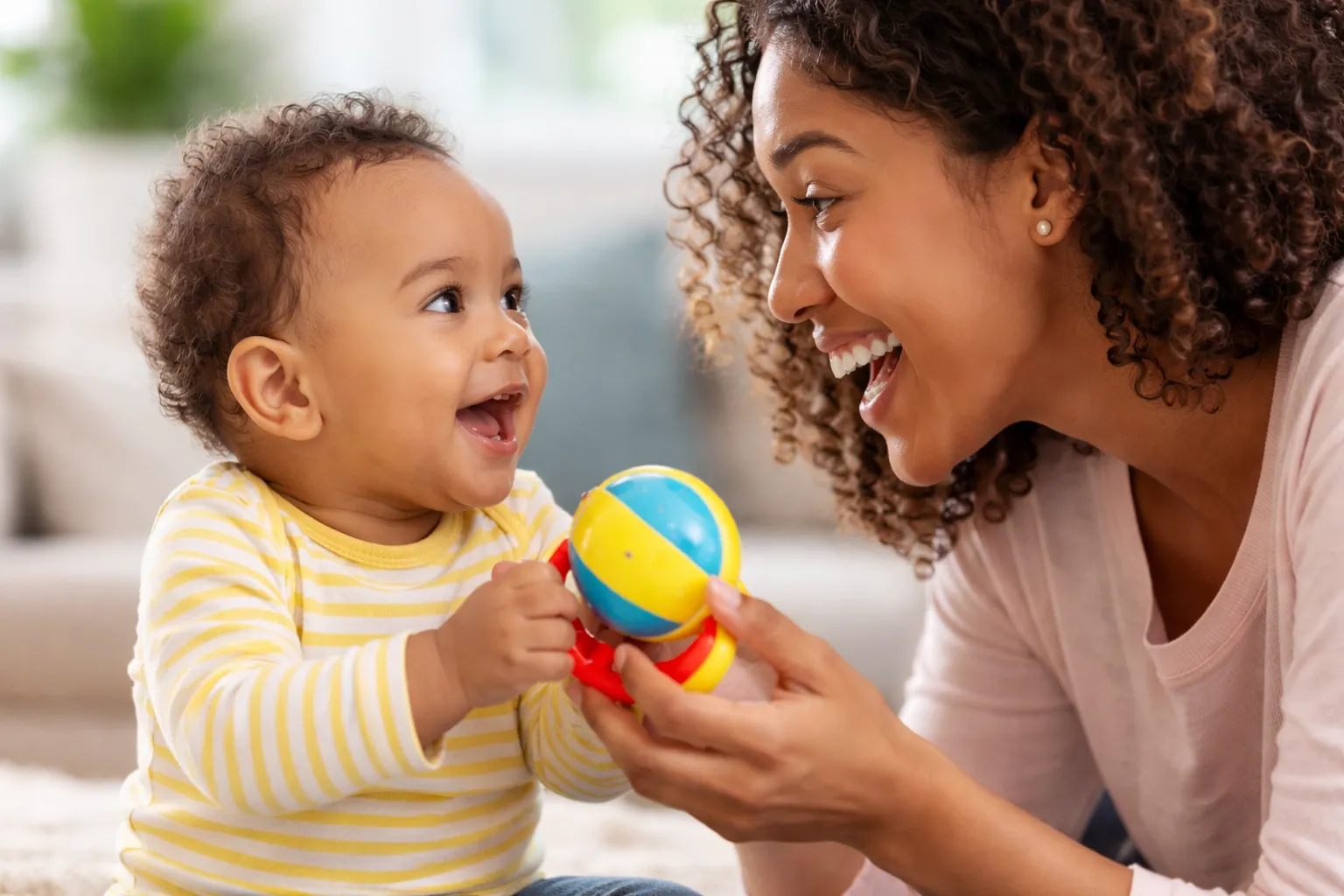 How Children Learn To Look Back and Forth Between a Toy and Your Face